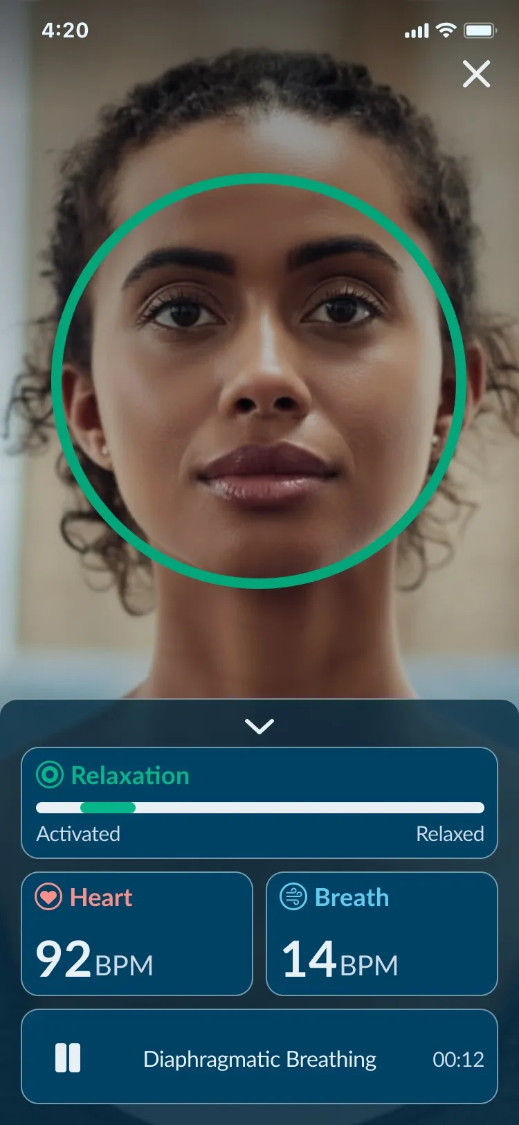 Juva session screen twelve seconds into Diaphragmatic Breathing: the camera view with a measurement ring around the user's open-eyed face, the relaxation indicator sitting near Activated, heart rate 92 BPM, breath rate 14 BPM.